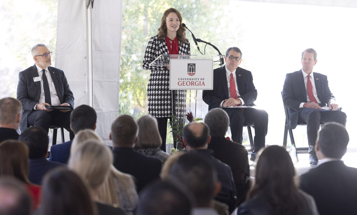 Student speaker Kylie Bruce makes remarks before the groundbreaking of the Poultry Science Complex. Behind her, from left, are Nick Place, dean and director, College of Agricultural and Environmental Sciences; UGA President Jere W. Morehead; and Gov. Brian Kemp. (Peter Frey/UGA)