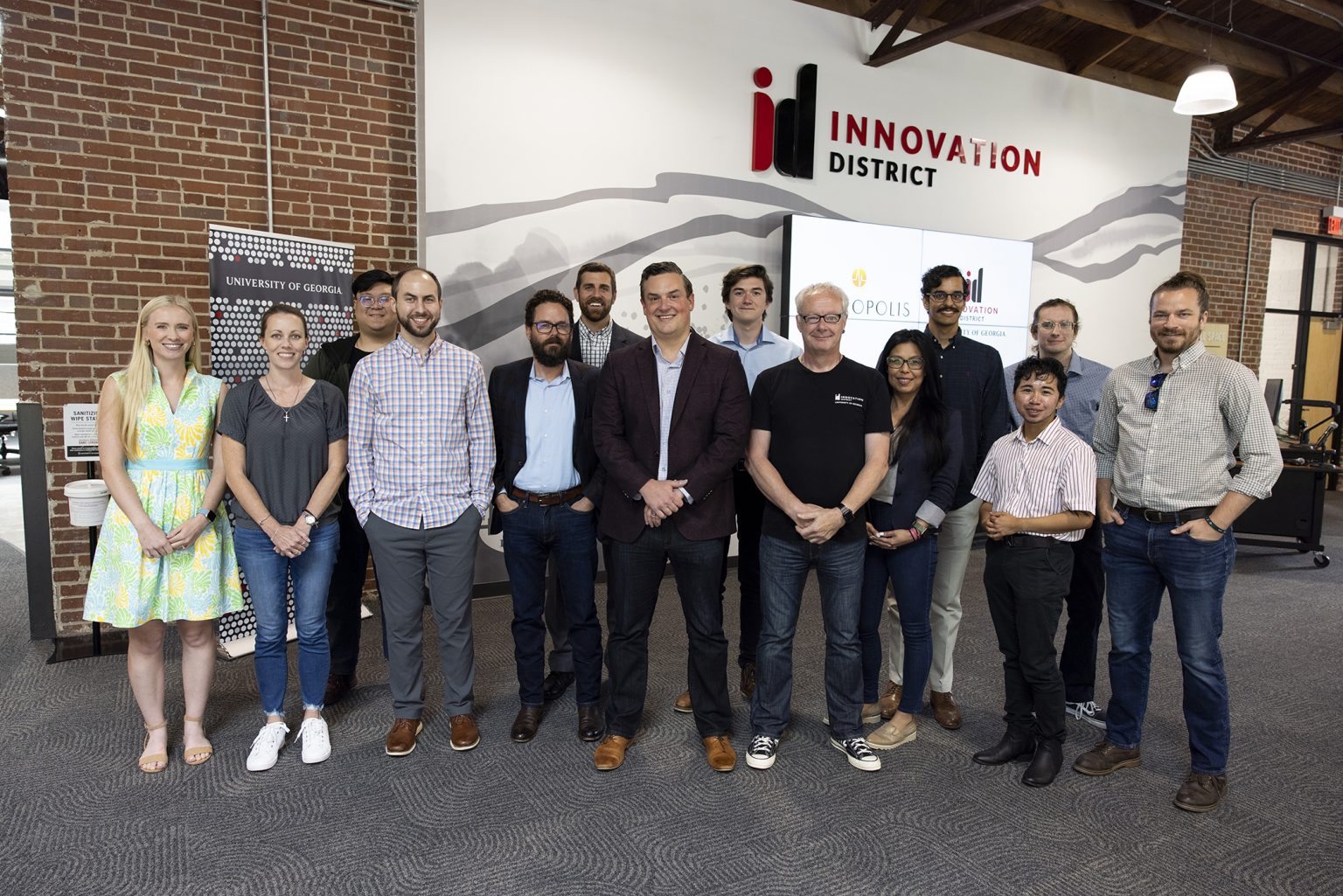 A group photo of Innovation Hub staff along with Metropolis executives and interns at the Innovation Hub. (Photo by Andrew Davis Tucker/UGA)