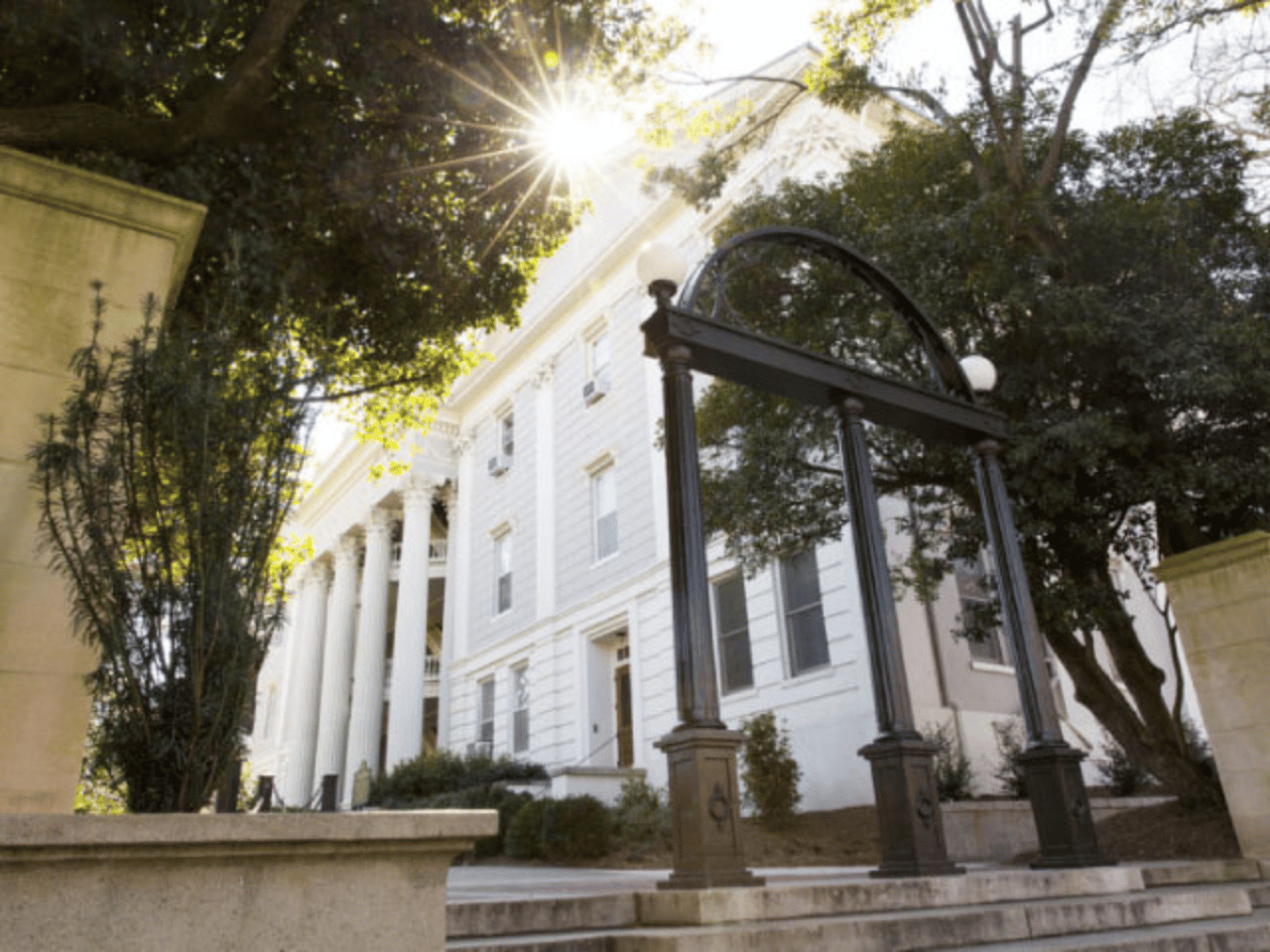 The Arch in the morning light with the Holmes-Hunter Academic Building in the background.