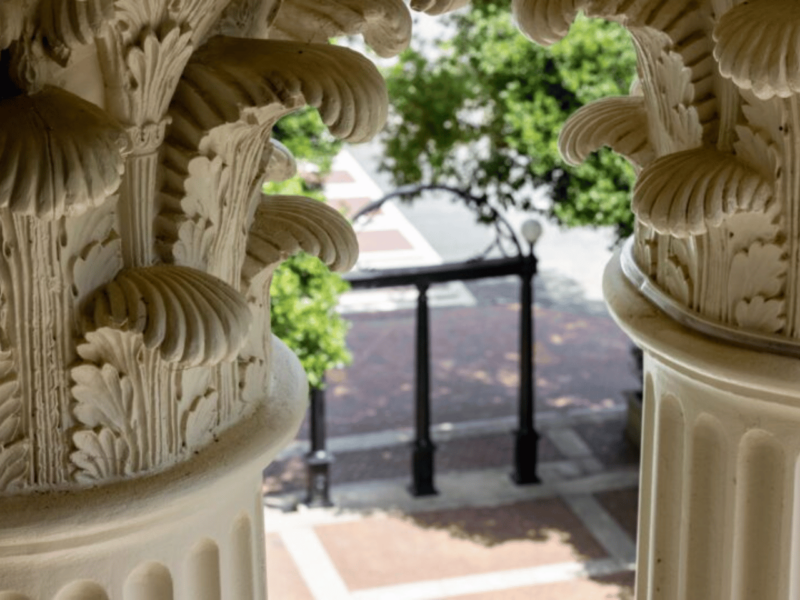 The Arch nestled between columns at UGA.