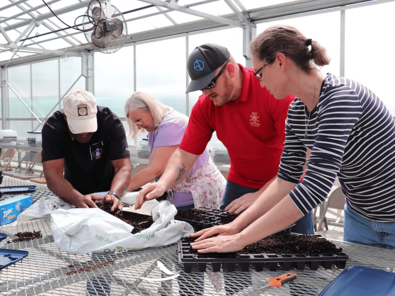 A group works in the UGA Farm Boot Camp.