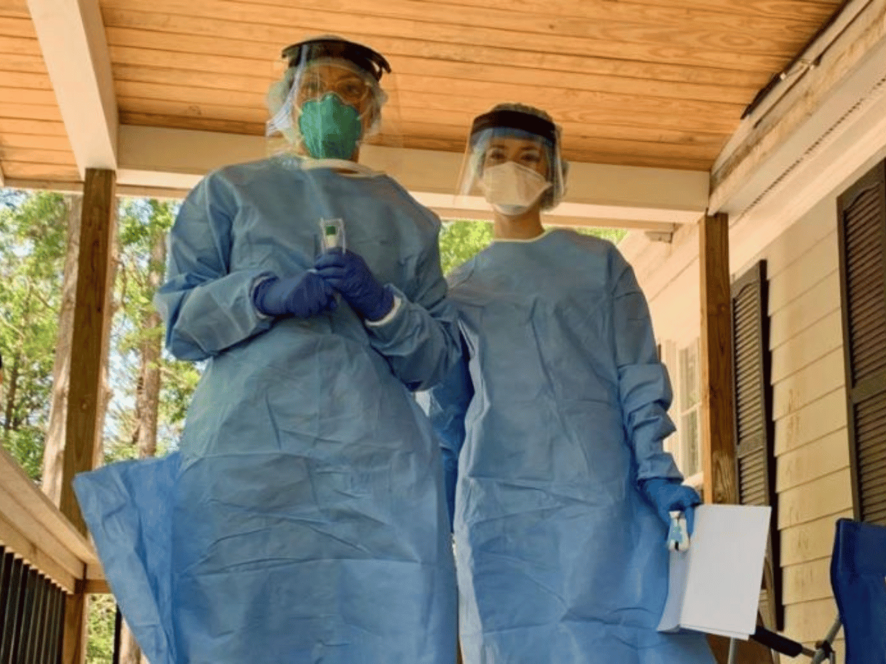 Two physicians wear PPE in Athens.