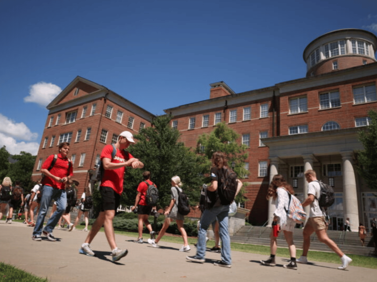 Students walk in front of the Miller Learning Center at UGA.