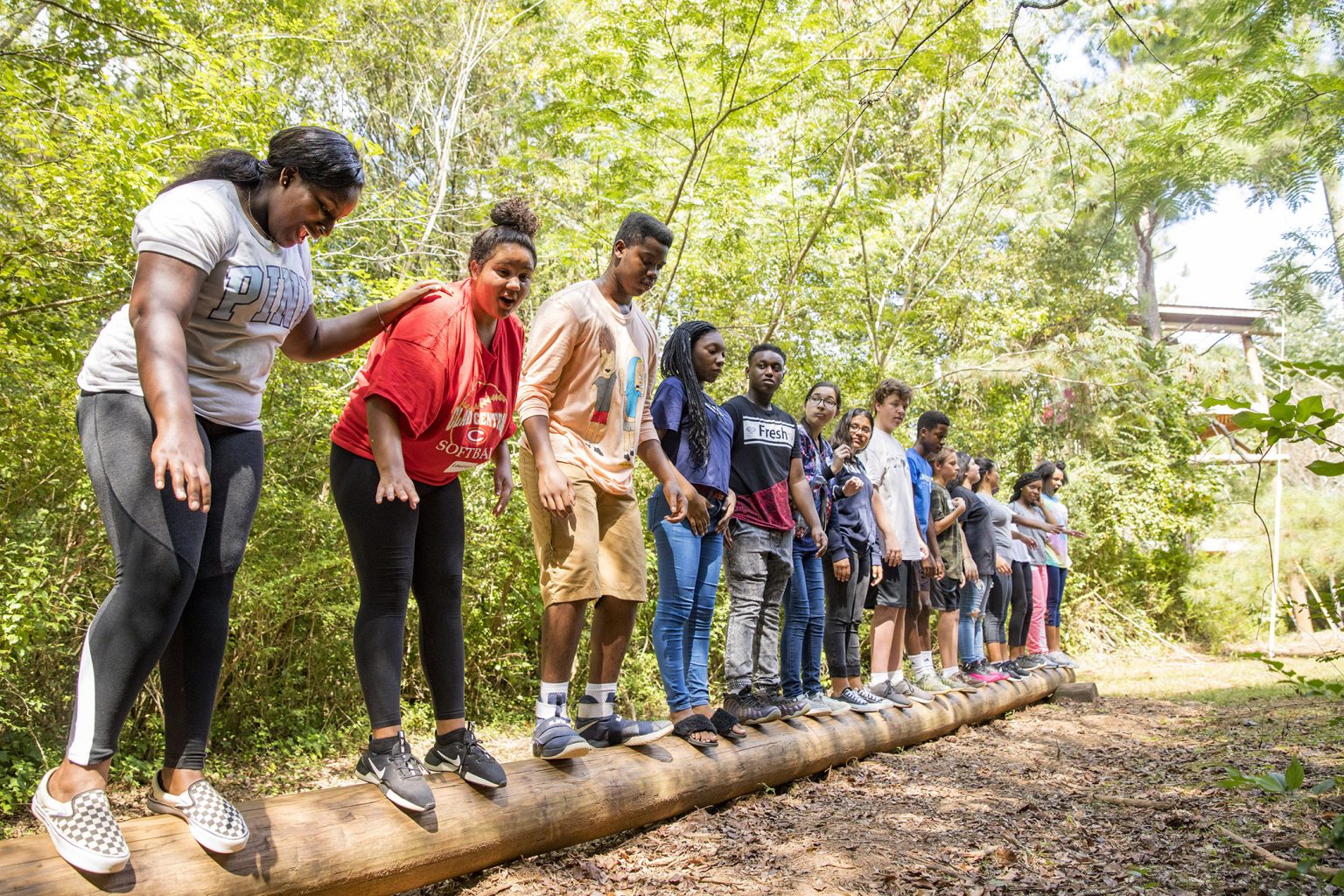 Tiffani Richardson, left, participates in the Georgia Possible outdoor challenge course with other Clarke County students in 2018. (Photo by Dorothy Kozlowski/UGA)