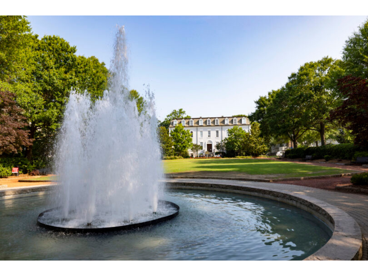 The Herty Field fountain with Morehead Honors College in the background. (Dorothy Kozlowski/UGA)