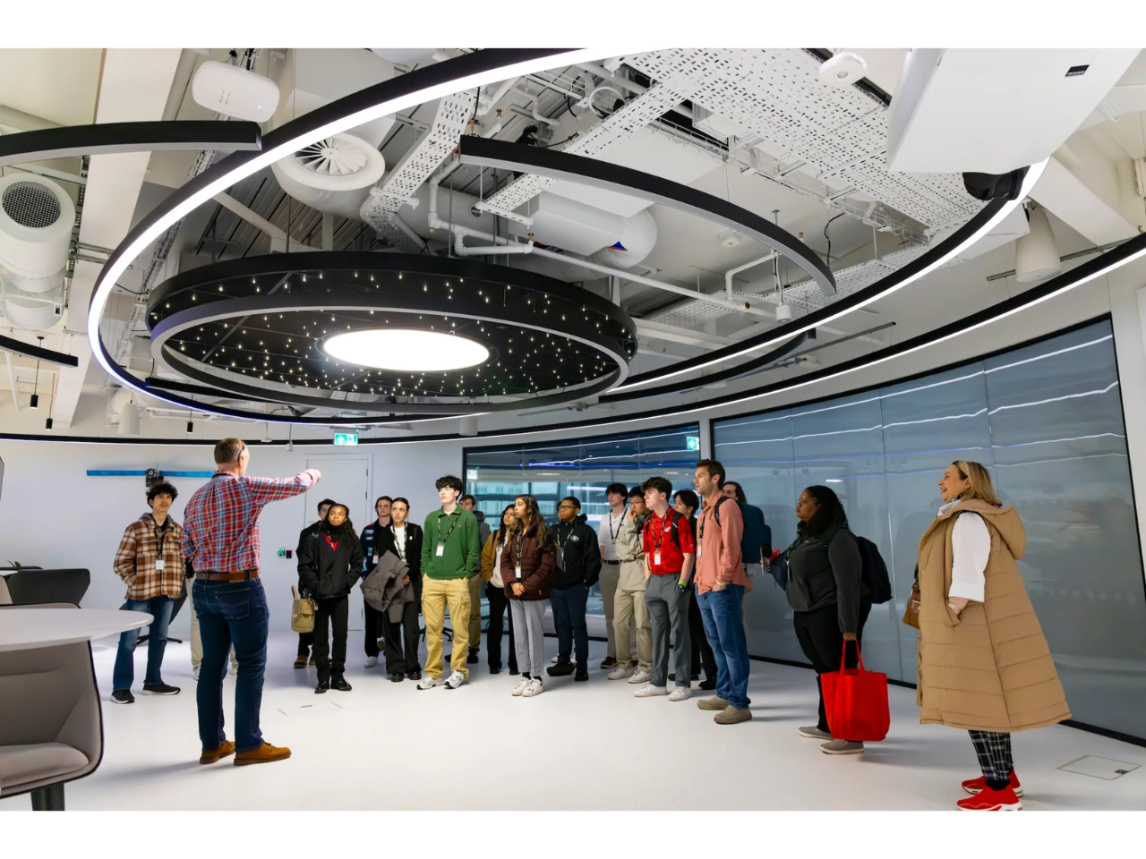 Viasat systems engineer John O’Connor speaks to UGA undergraduate students about the satellite communications business at the company headquarters during a Connect Abroad spring break trip to London, England. (Photo by Dorothy Kozlowski/UGA)